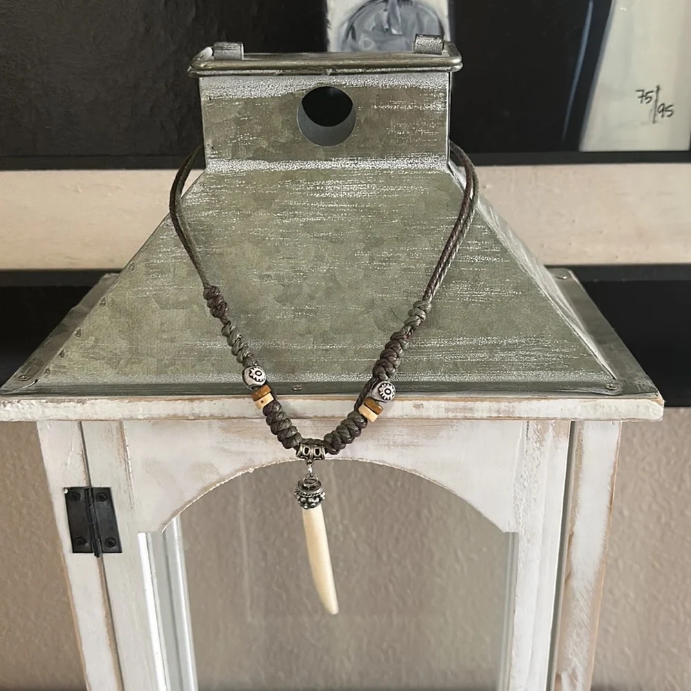 adjustable knotted necklace with carved bone pendant - Picture 2 of 3